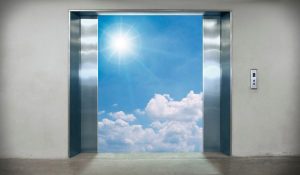 What is the difference between hydraulic and traction elevator